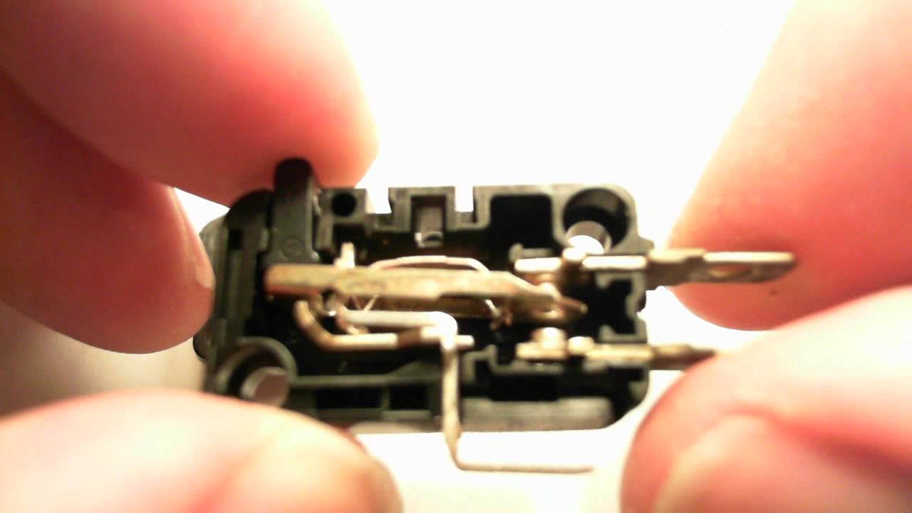 Inside a microswitch, showing its