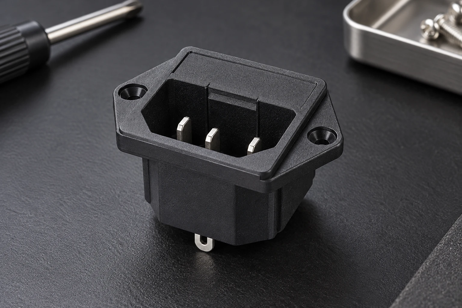 IPZ-4 male inlet on a dark desk beside separate tools