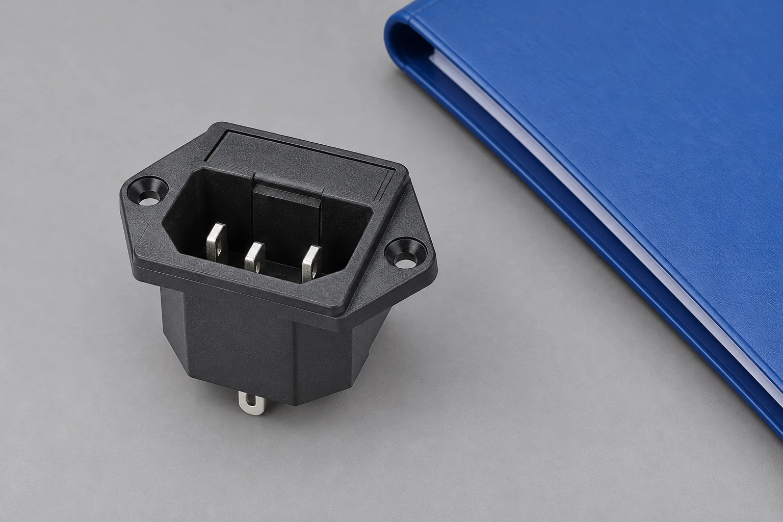 IPZ-4 inlet beside a closed blue materials folder