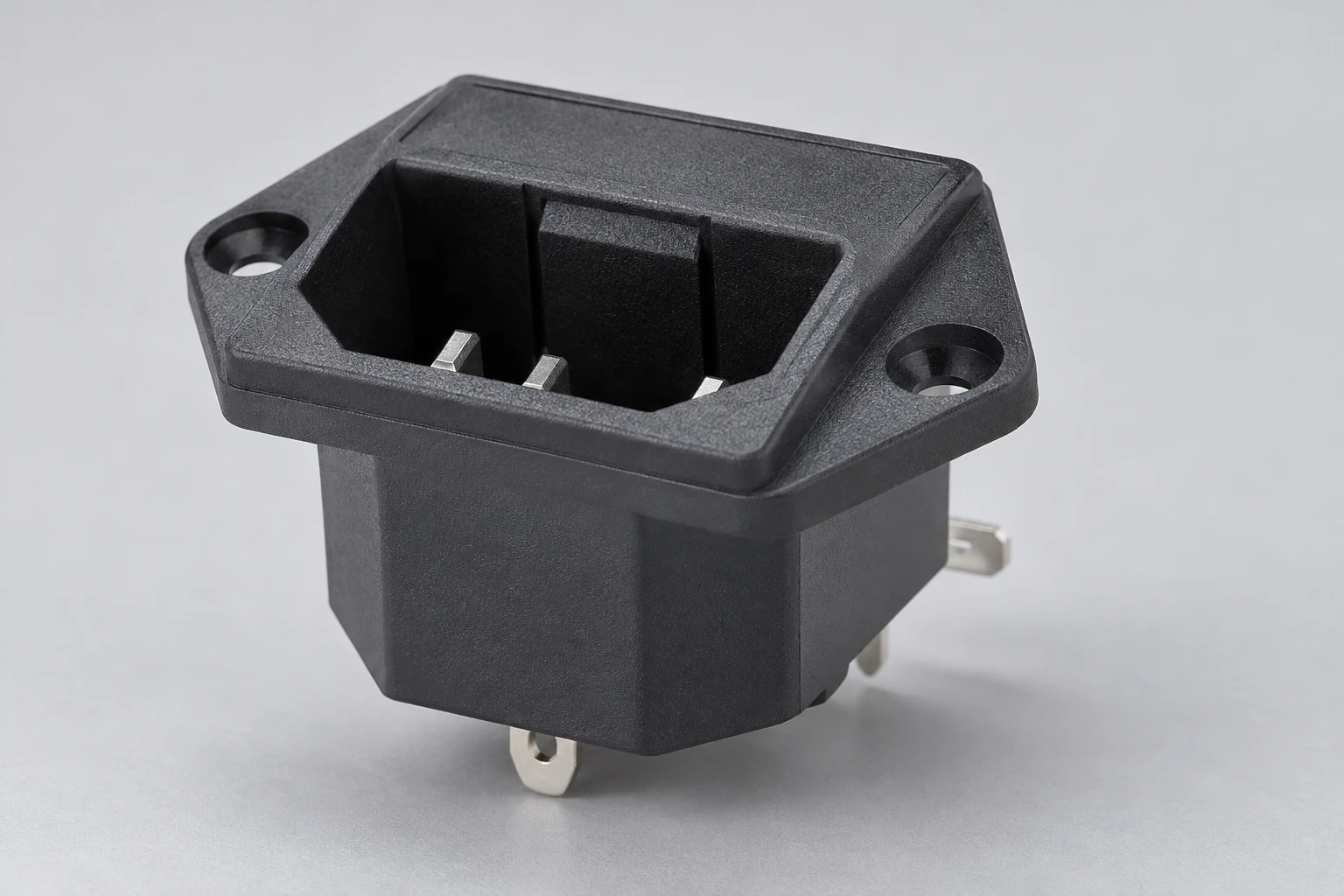 Molded housing and three male blades of an IPZ-4 inlet