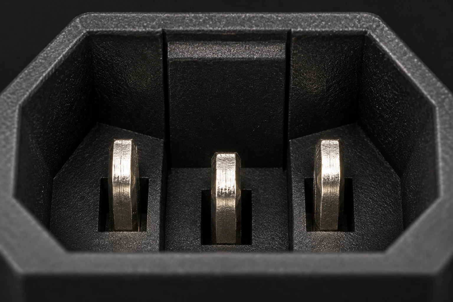 Macro inspection view of three intact IPZ inlet mating-contact blades